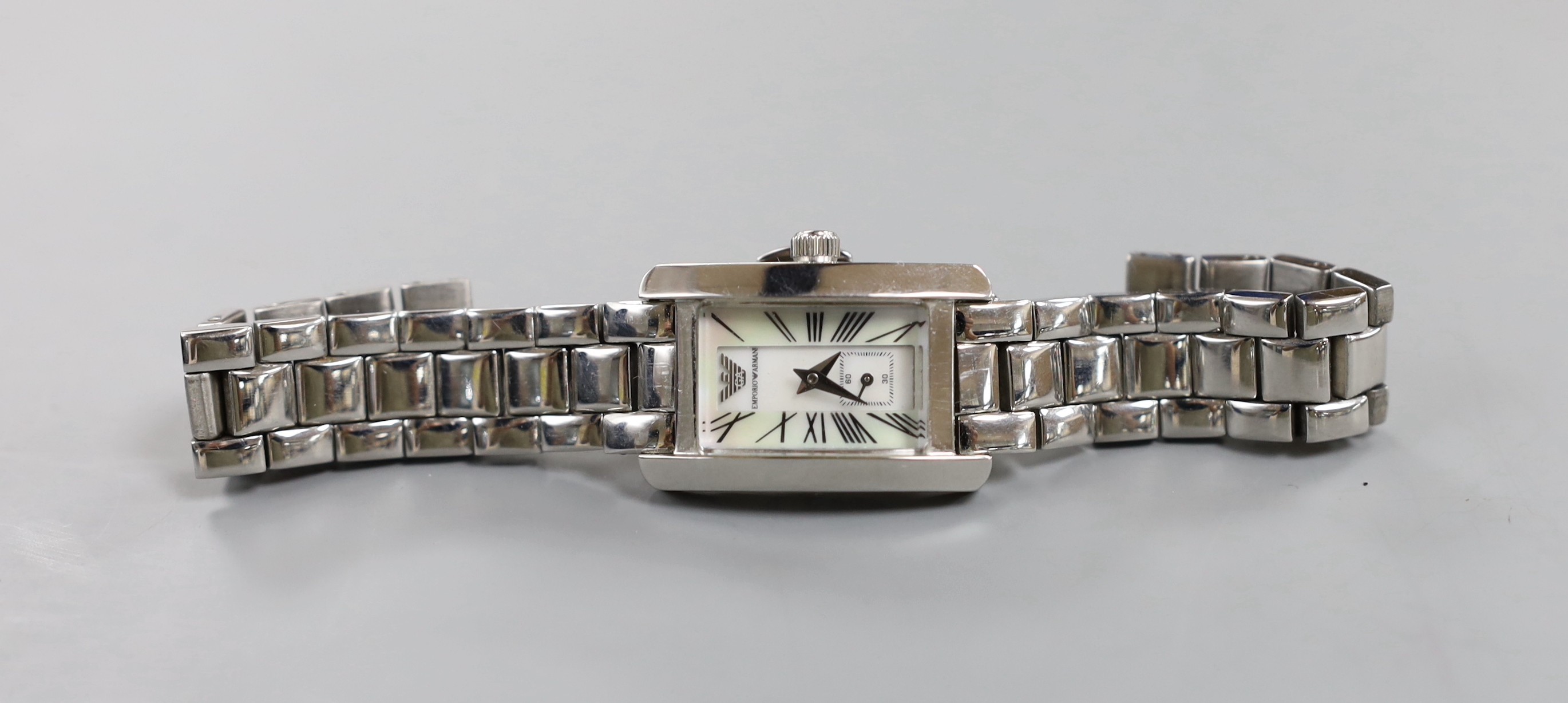 A lady's modern Emporio Armani quartz wrist watch, with mother of pearl dial and box.